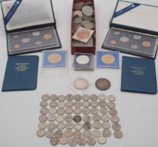 A lot of coins comprising a George V crown 1935, Canadian dollar 1967, Elizabeth II crowns, the