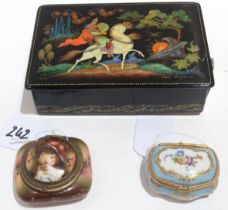 A Russian lacquer box, a French porcelain box and another decorated with a woman Condition Report: