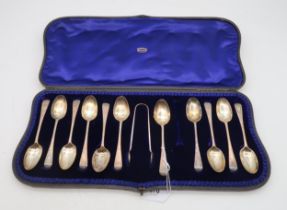 A cased set of silver tea spoons and sugar tongs, London, in the Old English pattern, bright-