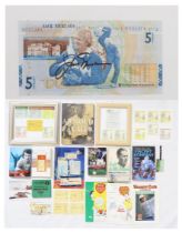 A collection of sporting memorabilia, to include a signed Jack Nicklaus £5 note, a first edition