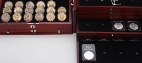 The Proof "American Eagle Silver Dollar Collection, part set with 17 coins in a wood collectors