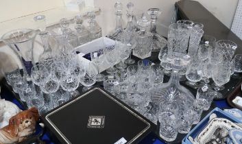 A collection of cut glass and crystal including Edinburgh drinking glasses, decanters etc