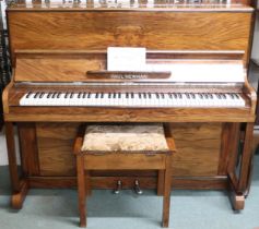 A 20th century walnut veneered Paul Newman upright overstrung piano, 114cm high x 134cm wide x