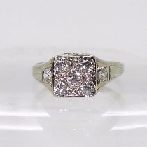 A vintage diamond cluster ring, set with estimated approx 0.70cts of old cut diamonds, to the