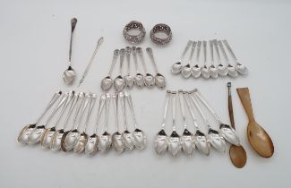 A collection of silver flatware including a set of Victorian silver tea spoons, by John