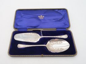 A cased silver cake server set, by Allen & Darwin, Sheffield, with engraved scrolling foliate