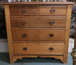 An early 20th century pine two over three chest of drawers, 105cm high x 107cm wide x 49cm deep