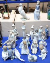 A collection of Lladro and Nao figures etc Condition Report:Available upon request