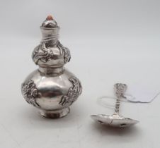 A Chinese silver snuff bottle, of double gourd form, decorated with dragons and a figure riding a