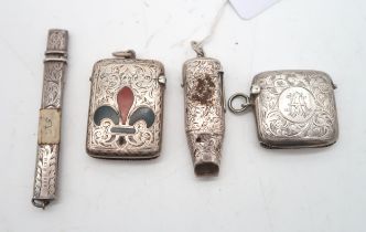 A collection of silver including a silver vesta, by John Grinsell & Sons, Birmingham, inlaid with