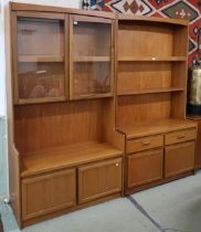 A lot of two mid 20th century teak William Laurence wall units, first with two open shelves over