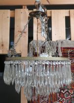 A lot comprising a pair of Edwardian Empire style three tier chandeliers with icicle drops, 60cm