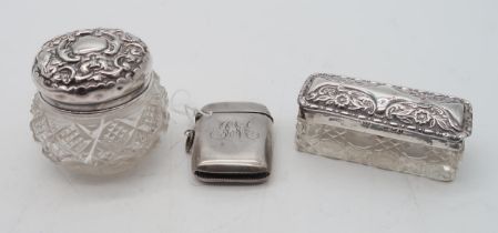Two cut glass silver lidded trinket boxes, Birmingham marks, and a silver vesta, by Joseph