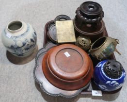 A Chinese blue and white ginger jar, a prunus example, a brass enamelled koro and assorted wooden
