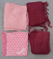 A pink and blue waffle blanket, two others in burgundy and cream and a red and white throw Condition