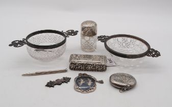 A collection of silver including two silver mounted cut glass dishes, one by Henry Matthews,