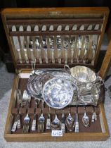A collection of EPNS including a cased canteen of cutlery,  coasters, sugar bowls and cream jugs etc