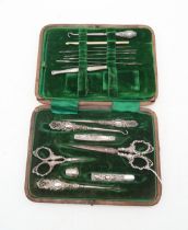 A cased silver and stainless steel sewing kit, by Duncan & Scobie, Birmingham, the file by Levi &