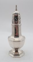 A George V large silver caster, by Barker Brothers, Birmingham 1934, of faceted form, 22cm high,