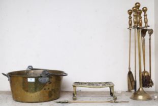 A mixed lot of brass to include fire irons, trivet and jelly pan Condition Report:Available upon