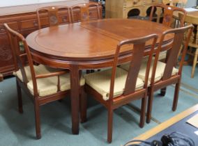 A 20th century Chinese hardwood D end extending dining table and eight chairs, table with shaped