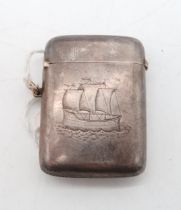 An Edwardian silver vesta, Birmingham 1909, engraved with a ship to one side, the reverse ' THE