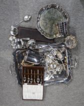 A collection of EPNS including a twin-handled serving tray, a salver, loose cutlery etc Condition