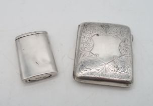 A silver cigarette case by William Hair Haseler, Birmingham, with scrolling foliate decoration,