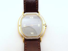 AN 18CT GOLD EBEL QUARTZ  With bi colour gold case, grey dial with gold dot and Roman numerals, with