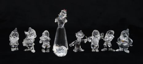 SWAROVSKI CRYSTAL WALT DISNEY GROUP OF SNOW WHITE AND THE SEVEN DWARVES together with apple shaped