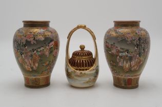 A PAIR OF SATSUMA BALUSTER VASES painted with panels of ladies and children amongst blossoming trees