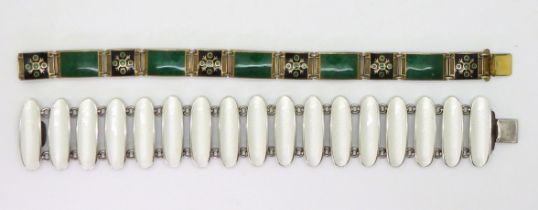 TWO SCANDINAVIAN BRACELETS a silver white enamelled modernist design cuff bracelet, designed by