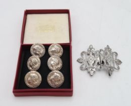 A SET OF SIX ART NOUVEAU STERLING BUTTONS maker's mark TD, stamped sterling with Diamond