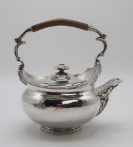 A GEORGE III SILVER TEAPOT by Robert Hennell I & Samuel Hennell, London 1807, of squat form, with