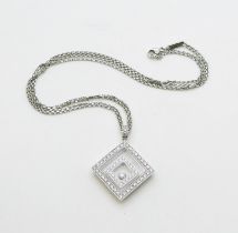 A CHOPARD HAPPY-SPIRIT PENDANT in 18ct white gold, the square pendant has two diamond set free