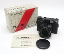 A PLAUBEL MAKINA 670 MEDIUM FORMAT CAMERA Fitted with a Nikkor 1:2.8/80 lens, no. 522843,