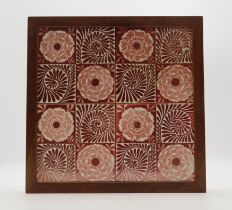 WILLIAM DE MORGAN (1839-1917) Four red lustre tiles, each quartered with alternating tudor rose