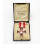 A WW1 GERMAN HANSEATIC (BREMEN) CROSS Of red enamel over white metal, with the Bremen arms
