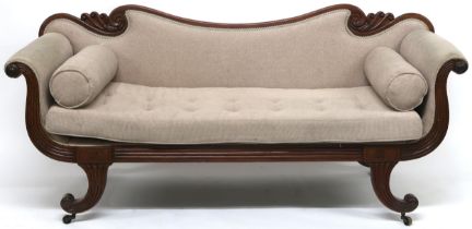 A 19TH CENTURY MAHOGANY FRAMED SCROLL ARMED SETTEE  with shaped carved backrest over beige