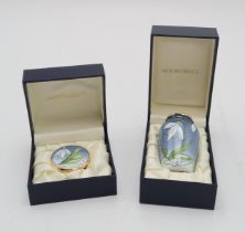 A MOORCROFT ENAMEL SNOWDROP TRINKET / PILL BOX 4.5cm diameter, together with a matching enamel vase,