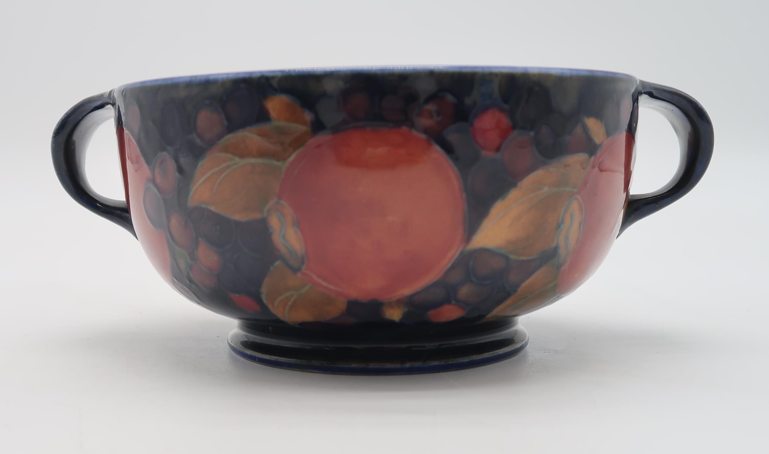 A MOORCROFT LEAF AND BERRY FLAMBE PATTERN DISH raised on a pedestal, blue signature to base and - Image 8 of 9