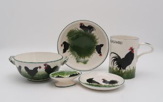 A WEMYSS TWO HANDLED POTTERY BOWL decorated with a black cockerel and hens, printed Thomas Goode &