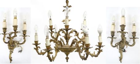 A CONTINENTAL ROCOCO STYLE GILT METAL CHANDELIER AND A PAIR OF WALL SCONCES  chandelier with nine