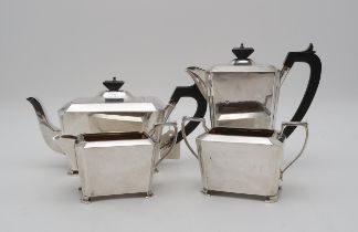 AN ART DECO FOUR PIECE SILVER TEA SERVICE by S. Blanckensee &Son, Chester 1933, of faceted form,