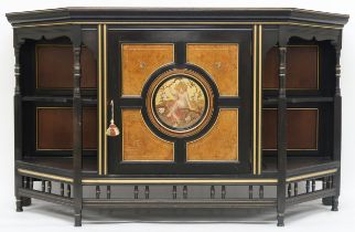 A VICTORIAN AESTHETIC MOVEMENT EBONISED AND GILT CABINET  shaped top with moulded cornice over