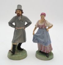 A PAIR OF RUSSIAN BISQUE FIGURES modelled as a man and woman dancing, in the style of Gardner