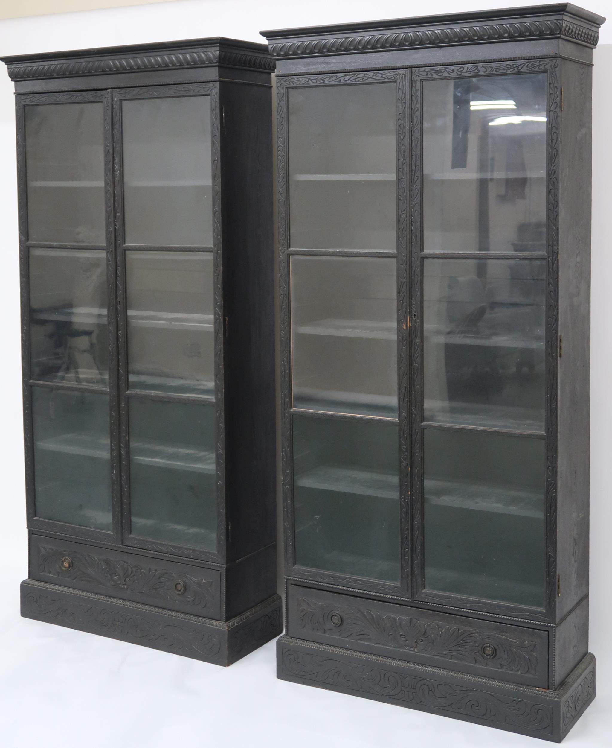 A PAIR OF 20TH CENTURY EBONISED GLAZED BOOKCASES  with gadrooned moulded cornices over pairs of - Image 2 of 12