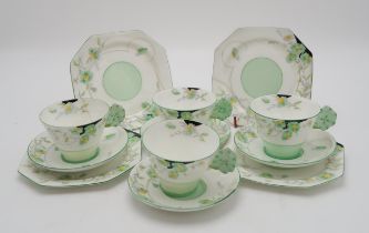 FOUR ROYAL PARAGON FLOWER HANDLE TRIOS each with green pansy handle and marguerite flower