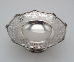 A GEORGE V SILVER FOOTED DISH by Charles Edward Nixon, Sheffield 1919, with geometric floral