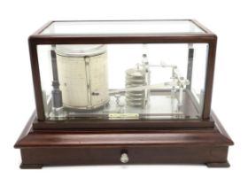A BAROGRAPH BY KELVIN BOTTOMLEY & BAIRD Ltd., GLASGOW Housed in a glazed case with bevelled panes